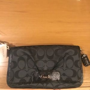 Brand new with tag coach black/grey wristlet